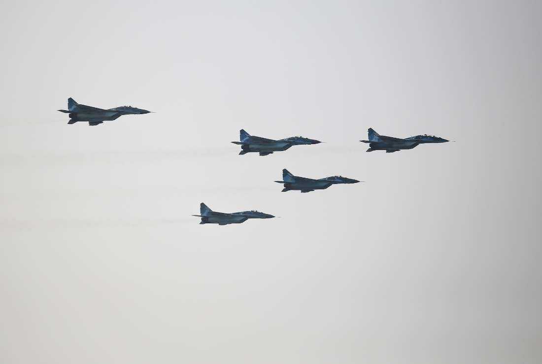 Myanmar Air Force fighter jets take part in a display to celebrate Myanmar's 77th Armed Forces Day in Naypyidaw on March 27, 2022