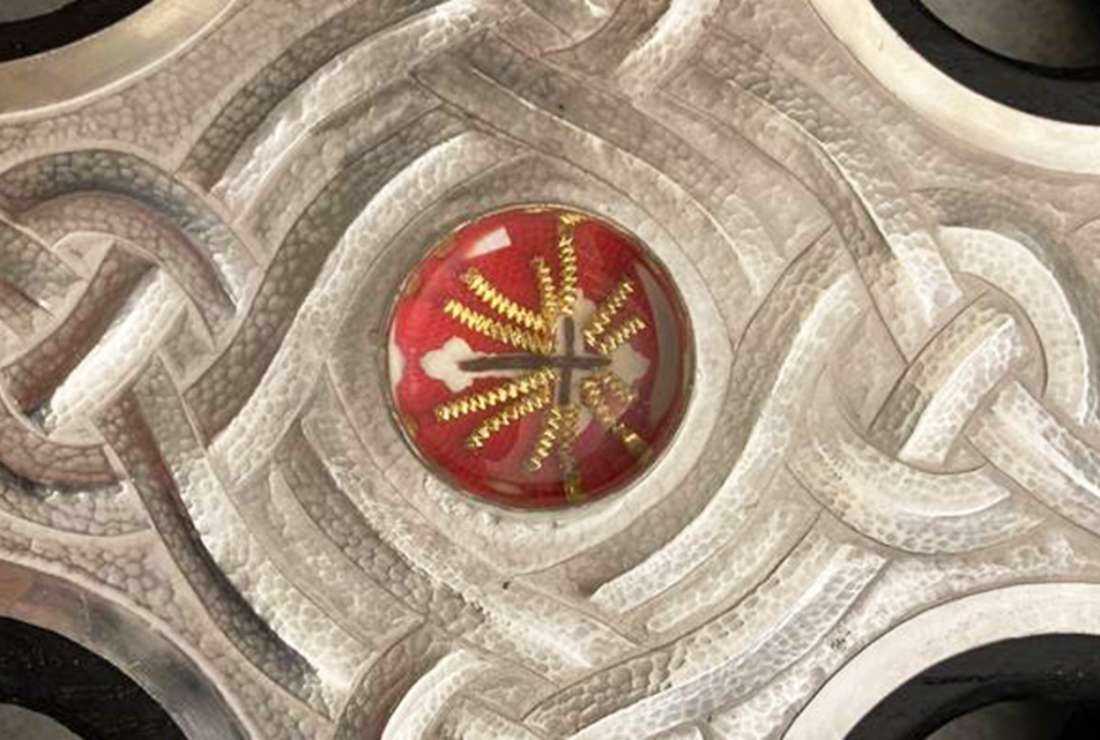 A close up image showing the shards of the true cross encased in the cross to be used during King Charles III coronation