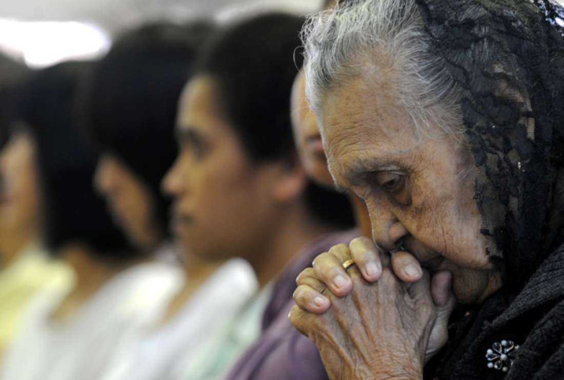 Malaysian Christians attend a Sunday service inside a church in Petaling Jaya near Kuala Lumpur on Jan 10, 2010, amid heightened ethnic tensions after a series of firebomb attacks on churches and an escalating row over the use of the word 'Allah' as a translation for the Christian God in the Muslim-majority nation