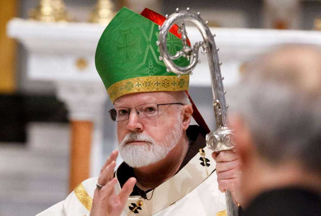 Cardinal Seán P. O'Malley gestures towards the audience during St. Patrick's Day Mass at a church in Boston on March 17, 2020