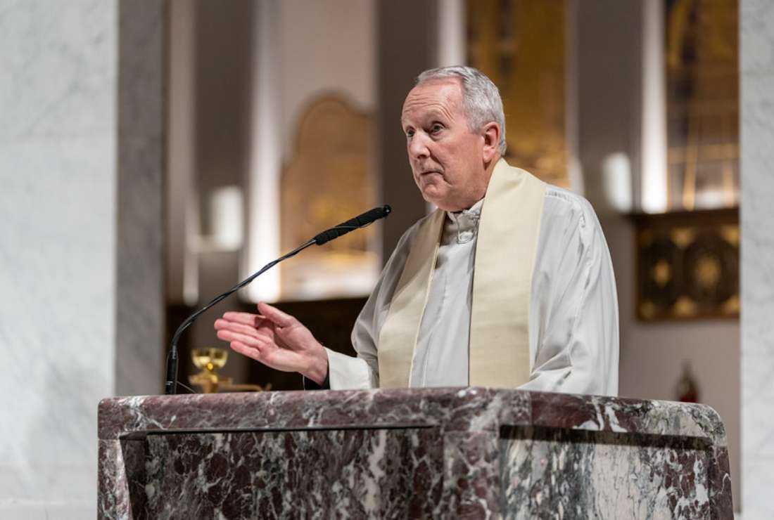  Msgr. Charles Fink gestures during a sermon at Notre Dame Church in New York