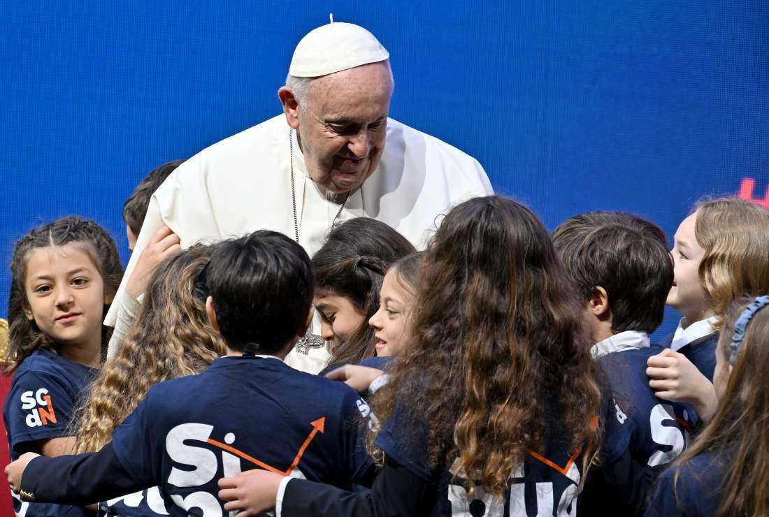 Pope Francis greets children during a two-day 'General States of Birth' conference in Rome on May 12