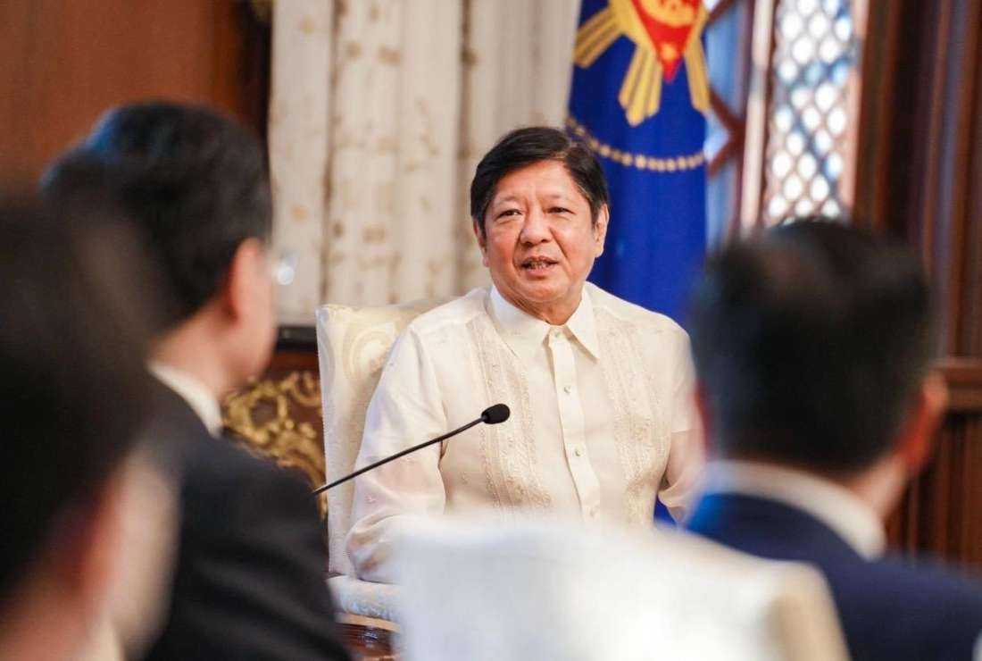 Philippine President Ferdinand Marcos Jr. is seen welcoming Chinese Foreign Minister Qin Gang during a courtesy call at Malacanang Palace in Manila, in this handout photo taken on April 22 from the Presidential Communications Office