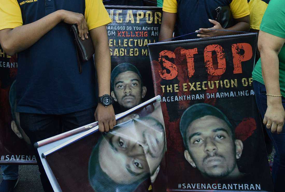 Activists protest against the planned execution of Nagaenthran K. Dharmalingam, a mentally disabled Malaysian man sentenced to death for trafficking heroin into Singapore in 2009, outside the Singapore High Commission in Kuala Lumpur on April 23, 2022