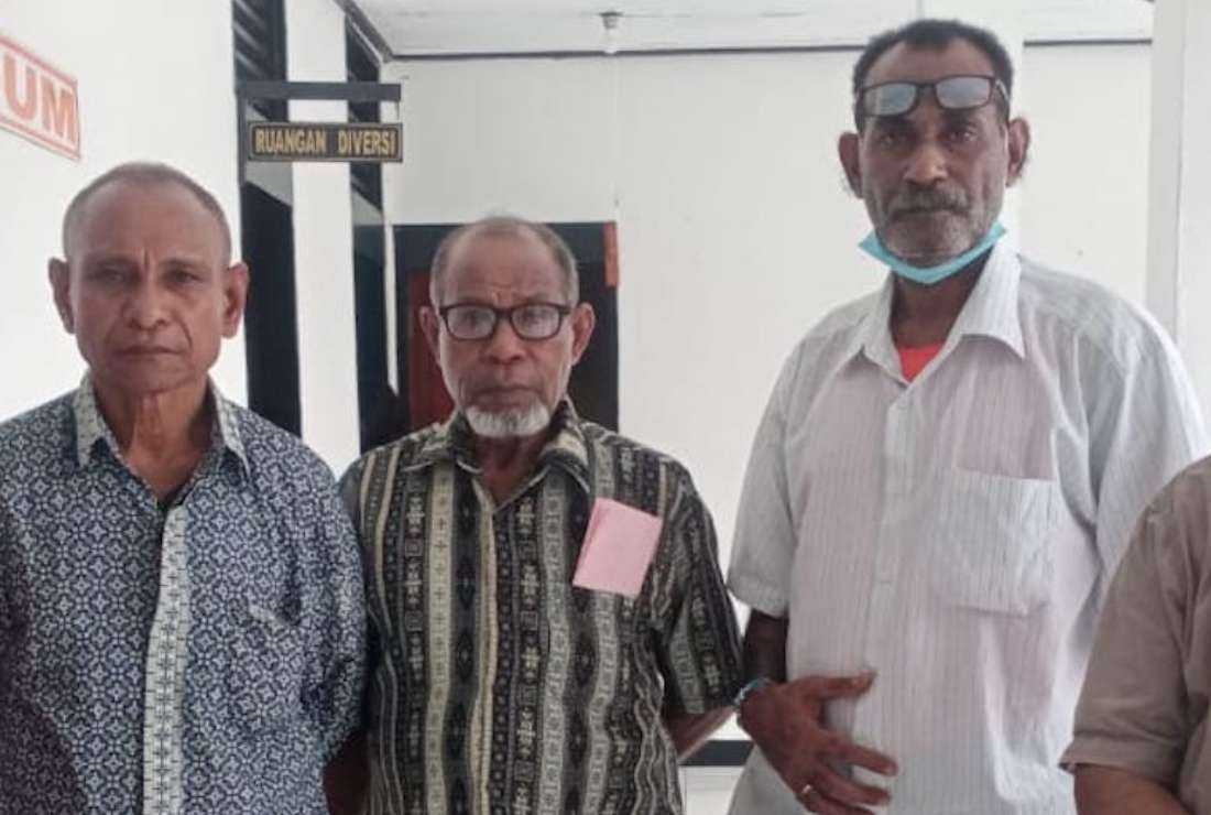 Three Papuans (from left) Kostan Karlos Bonay, Andreas Sanggenafa, and Hellesvred Bezaliel Soleman Waropen were found guilty of committing treasonous acts by an Indonesian court on June 12