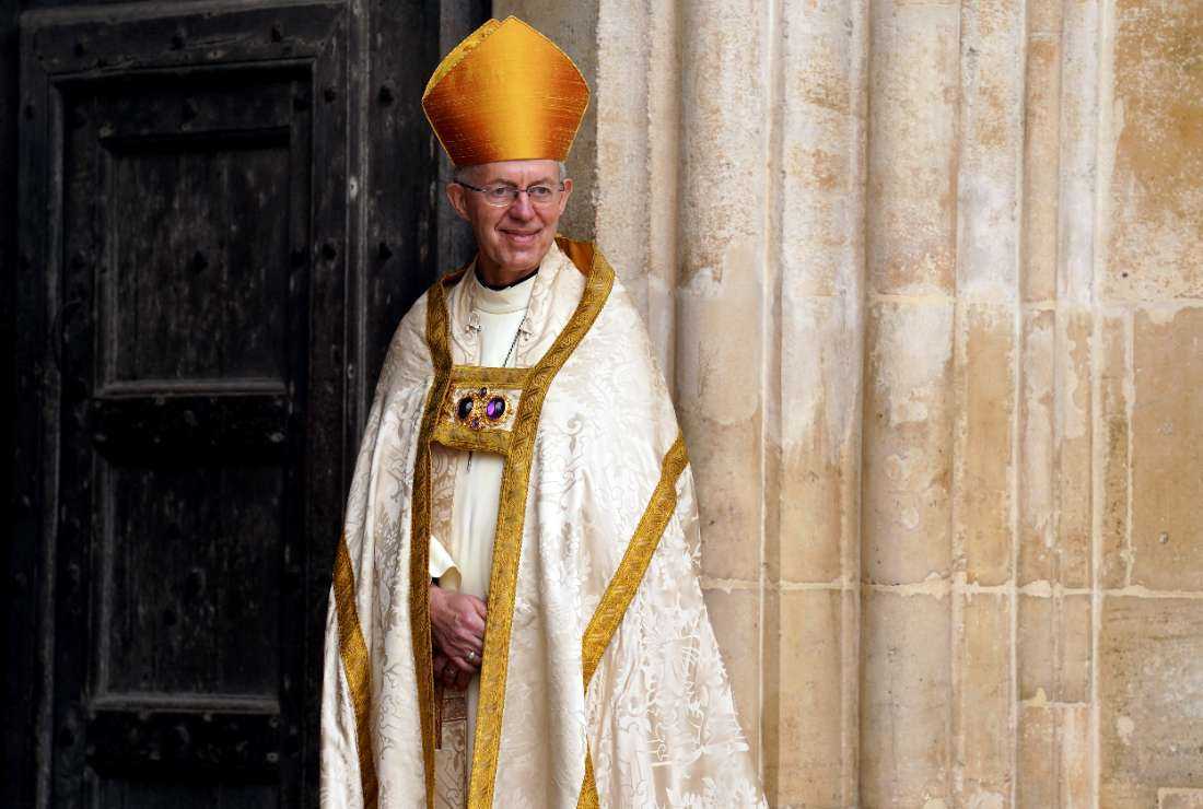Archbishop of Canterbury Justin Welby smiles at Westminster Abbey in central London on May 6 ahead of the coronations of Britain's King Charles III and Britain's Camilla, Queen Consort