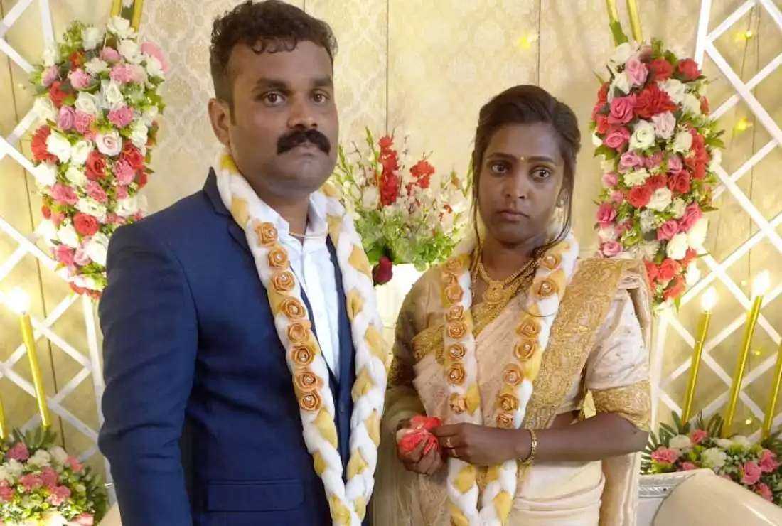 Groom Justin John and bride Vijimol Shaji pose for photographs after their traditional marriage ceremony at St. Francis Xavier’s Church in Kottody village in southern Kerala state on May 18. They were denied sacramental marriage following the endogamy practice of the Kottayam Knanaya Archdiocese