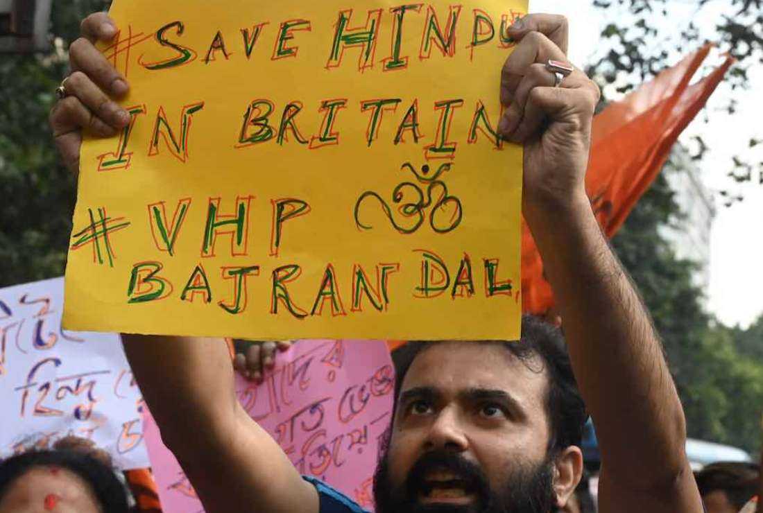 An activist of the Hindu nationalist Vishva Hindu Parishad or World Hindu Council shouts slogans during a protest against the recent anti-Hindu violence in Britain, near the British deputy high commission in Kolkata on Sept. 26, 2022