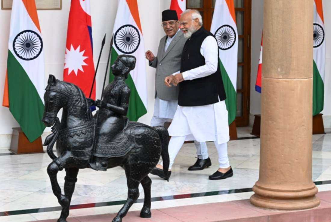Nepalese Prime Minister Pushpa Kamal Dahal (left) and Indian Prime Minister Narendra Modi walk before their meeting at Hyderabad House in New Delhi on June 1. Nepal shares a 1,850-km long border with India and their shared special ties are based on the India-Nepal Treaty of Peace and Friendship inked way back in 1950