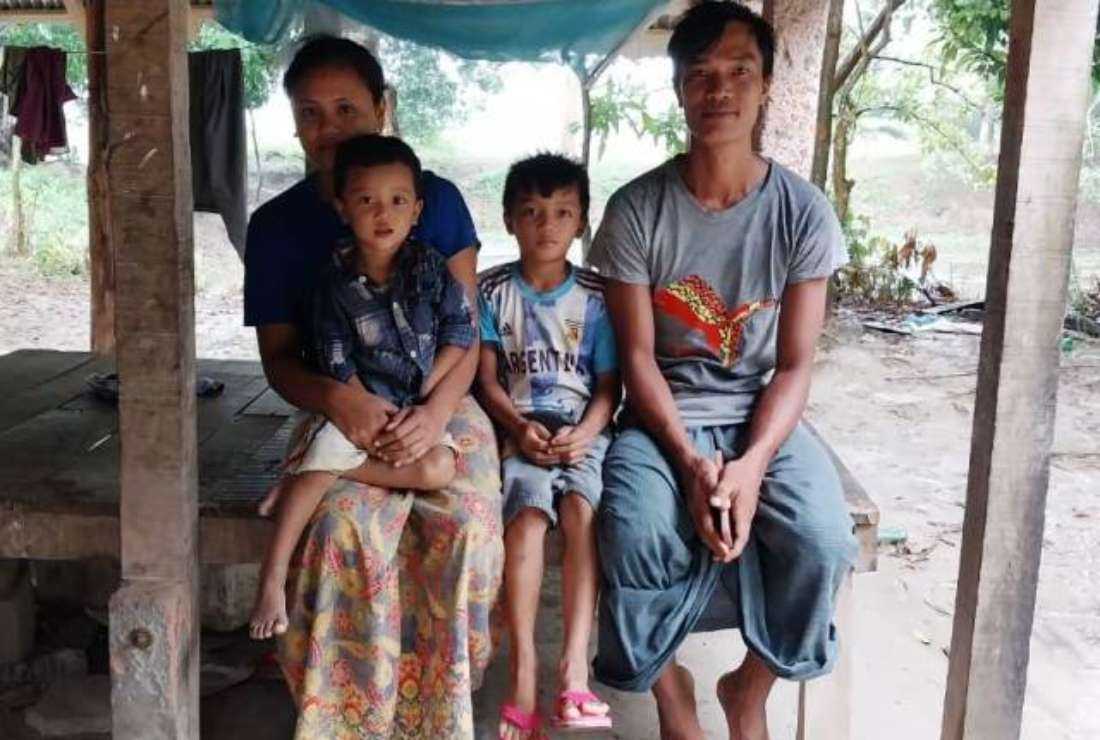Chu Shwe, his wife Cho Nai and their two sons beside the pond in the Rakhain village of Nayapara in Mohipur, a rural area in Bangladesh’s southern coastal district of Patuakhali