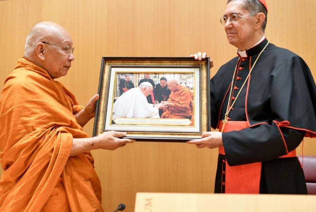 The Venerable Somdet Phra Mahathirachan is seen with Cardinal Miguel Ángel Ayuso during a meeting in the Vatican on June 15