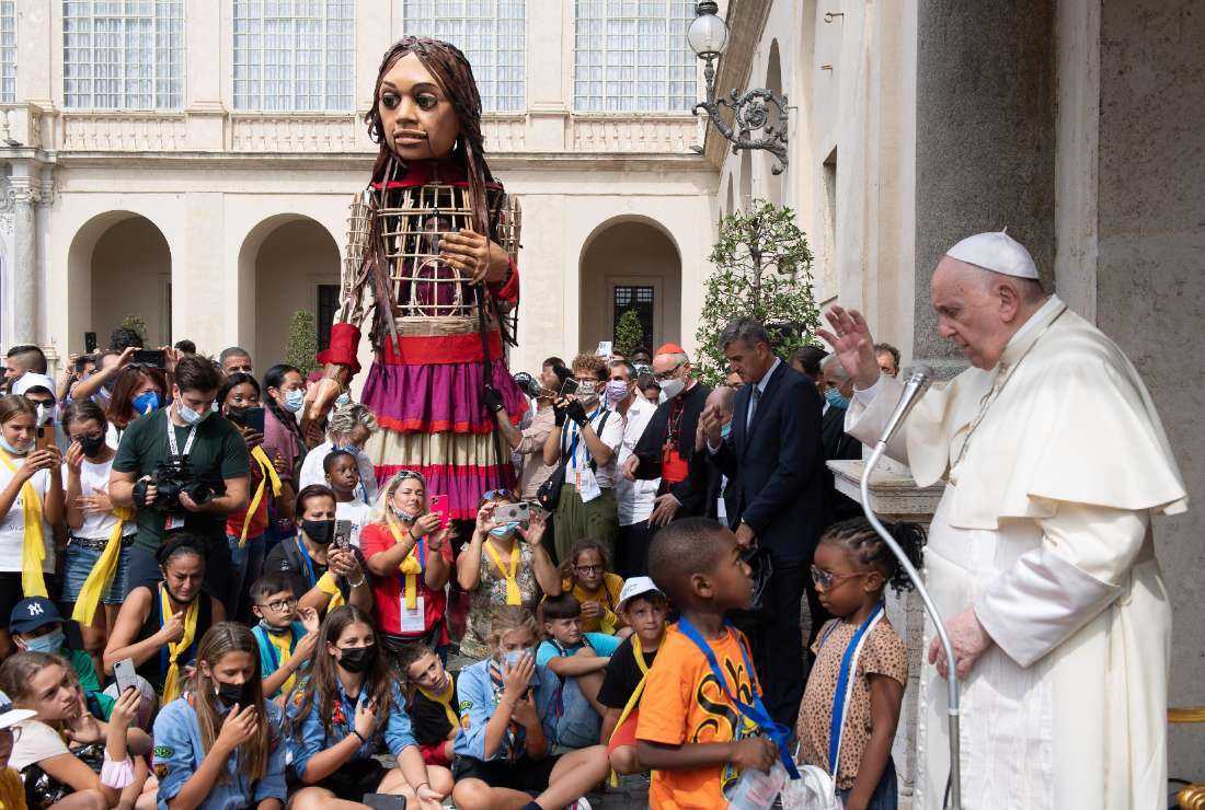 This handout photo released and taken on Sept. 10, 2021, by The Vatican Media shows Pope Francis during an audience of the children participating in the 'Open' Hospitality March on the occasion of the World Day of Migrants and Refugees in the Vatican