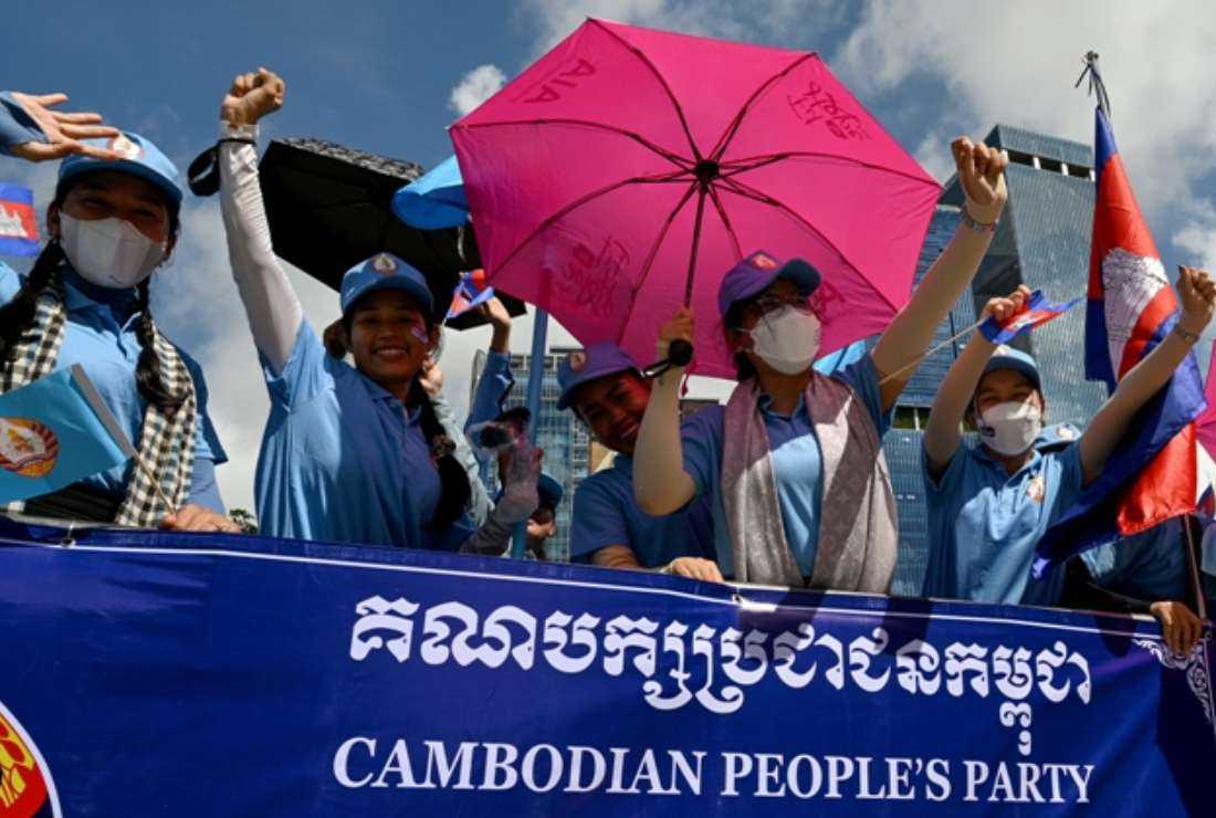Supporters of the ruling Cambodian People's Party (CPP) participate in a campaign rally on July 1 ahead of the upcoming election in Phnom Penh. Cambodians go to the polls on July 23