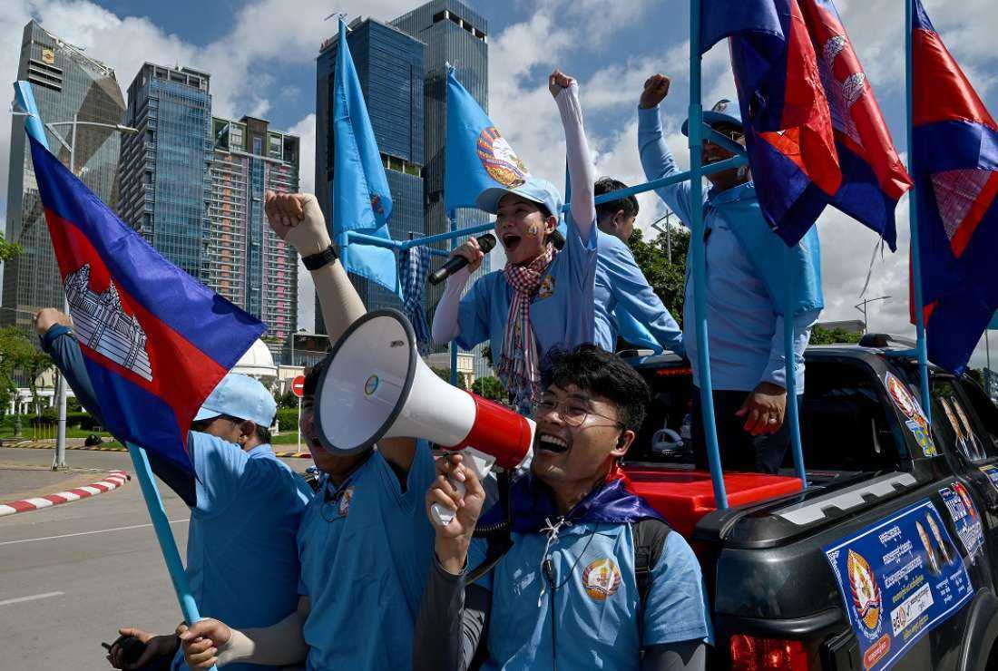 Supporters of the ruling Cambodian People's Party (CPP) participate in a campaign rally ahead of the upcoming election in Phnom Penh on July 1, 2023. Cambodians go to the polls on July 23
