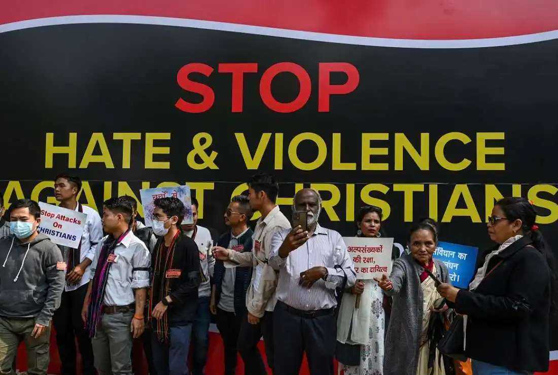 Activists and members representing the Christian community take part in a peaceful protest rally against what they claim as an increase in hostility, hate, and violence against Christians in various states of the country, in New Delhi on Feb 19