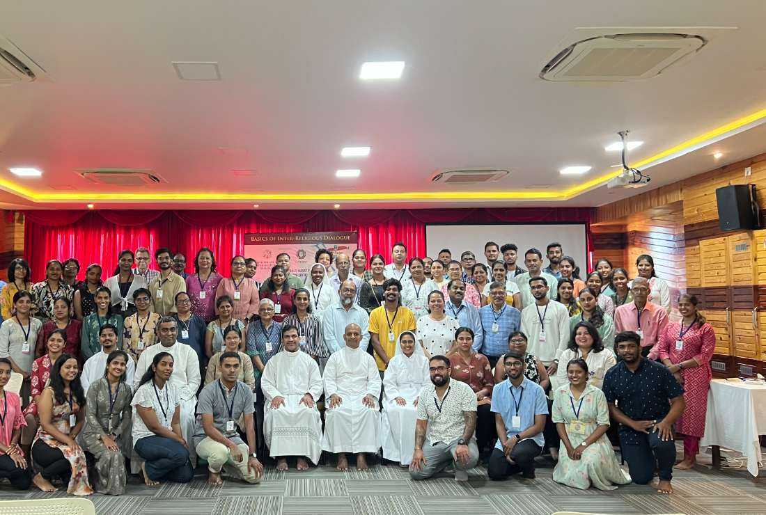 Participants of the two-day 'Basic of Inter-Religious Dialogue' pose for a photo session at the Pilar Theological Institute in the western coastal state of Goa