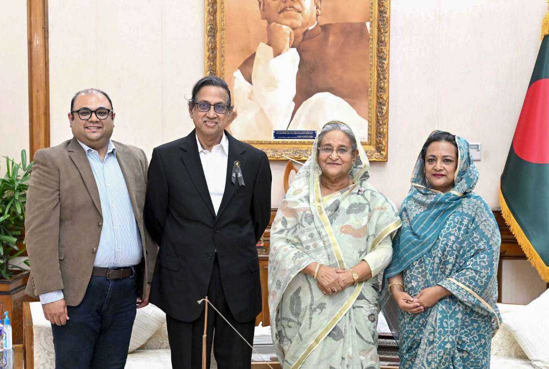 This handout photograph taken and released by the Bangladesh Prime Minister's Office on Aug. 10 shows Bangladeshi national Akam Sofyol Anam (second from left), his wife Kazi Nasreen Anam (right), and son Sakeef Anam (left) as they meet Bangladesh Prime Minister Sheikh Hasina (second from right) in Dhaka after he was freed after a year and a half abduction by Al-Qaeda in Yemen