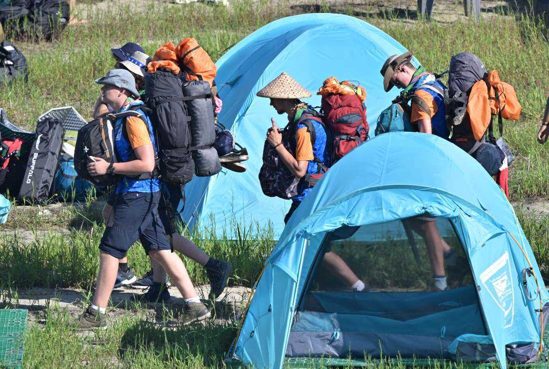 Scouts prepare to leave the campsite of the World Scout Jamboree in Buan, North Jeolla province on Aug. 8