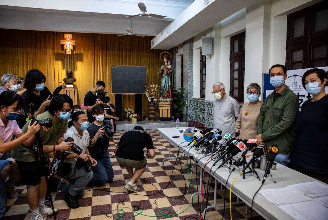 Cardinal Joseph Zen (fourth from right) with others attends a press conference at Salesian Missionary House in Hong Kong on Aug. 18, 2021, to announce the closure of the 612 Humanitarian Relief Fund. Two men arrested recently were linked to the now-defunct group that helped pay legal and medical costs for people arrested during the 2019 protests