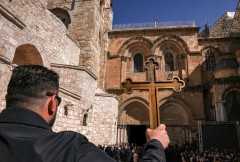 Metal fence sign of worsening conditions for Holy Land Christians