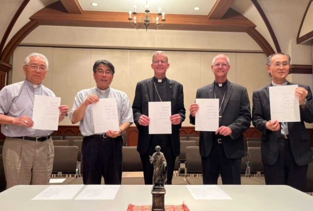 The signatories of an Aug. 9, 2023, declaration to work together toward the abolition of nuclear weapons are, from left, retired Archbishop Joseph Mitsuaki Takami of Nagasaki, Japan; Archbishop Peter Michiaki Nakamuru of Nagasaki; Archbishop John C. Wester of Santa Fe, New Mexico; Archbishop Paul D. Etienne of Seattle; and Bishop Alexis Mitsuru Shirahama of Hiroshima, Japan. The pledge was signed in Nagasaki on the 78th anniversary of the Aug. 9, 1945, atomic bombing of the city