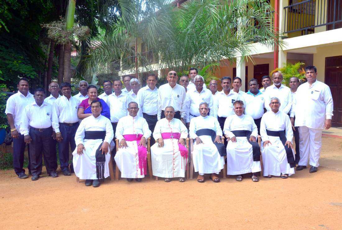 A group of 20 lay leaders, who organized the feast of Sri Lanka's Madhu shrine, pose for a photograph with Bishop Jude Nishantha Silva  (front row, second left), the newly elected bishop of Badulla diocese, and some priests