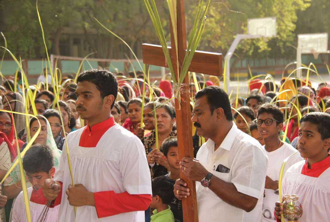 Catholics from Delhi archdiocese attend a procession during Palm Sunday on April 9, 2019