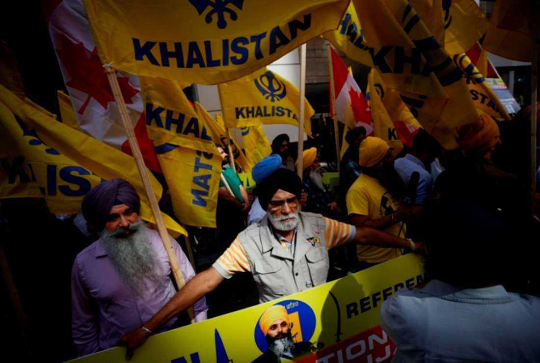 Demonstrators gather in support of Khalistan, an advocated independent Sikh homeland, during a Sikh rally outside the Consulate General of India, in Toronto, Ontario, Canada, on Sept. 25. Prime Minister Justin Trudeau's assertion on Sept. 17 that agents linked to New Delhi may have been responsible for the June 18 murder of Hardeep Singh Nijjar, a Canadian citizen, sent shock waves through both countries, prompting the reciprocal expulsion of diplomats.
