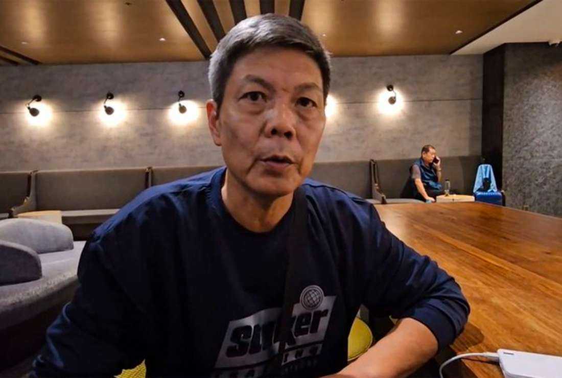 Chinese dissident Chen Siming speaks during an interview at Taoyuan International Airport's transit lounge in Taipei, Friday, Sept. 22