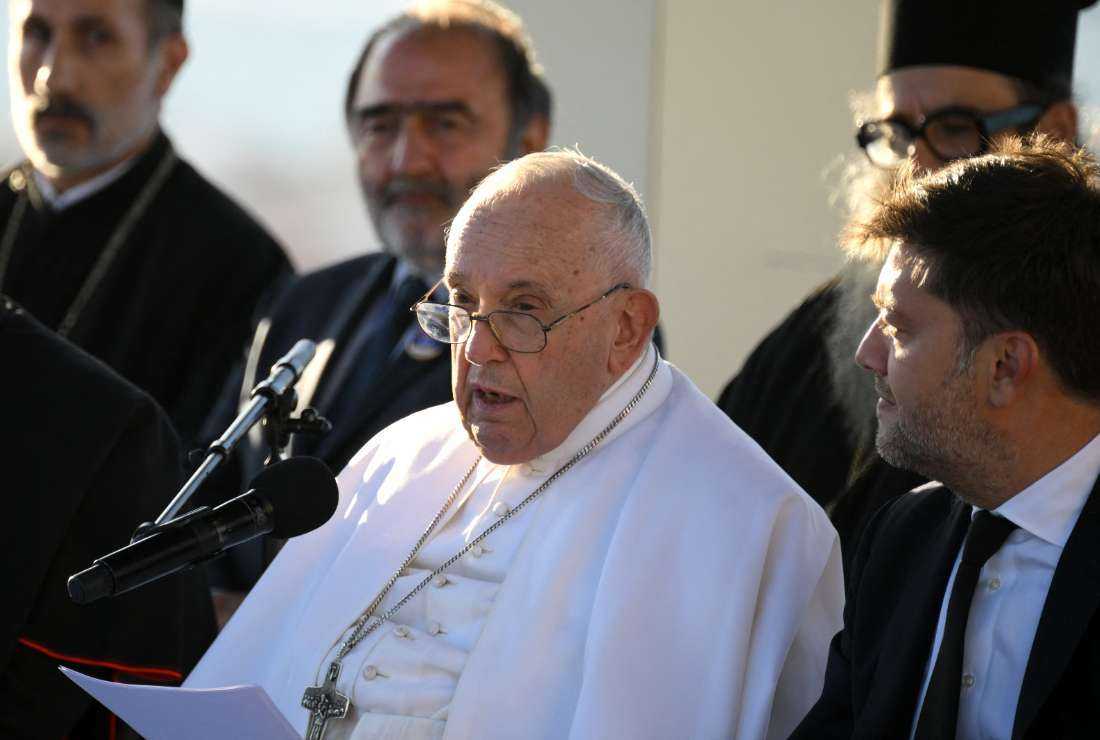 Pope Francis delivers a speech during a homage at the memorial dedicated to sailors and migrants lost at sea at the Basilica of Notre-Dame de la Garde in Marseille, southern France,