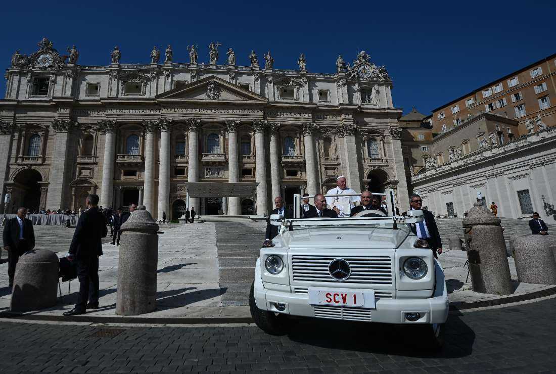 Pope Francis greets the crowd from the popemobile as he leaves after the weekly general audience on Sept. 27 at St Peter's Square in The Vatican.