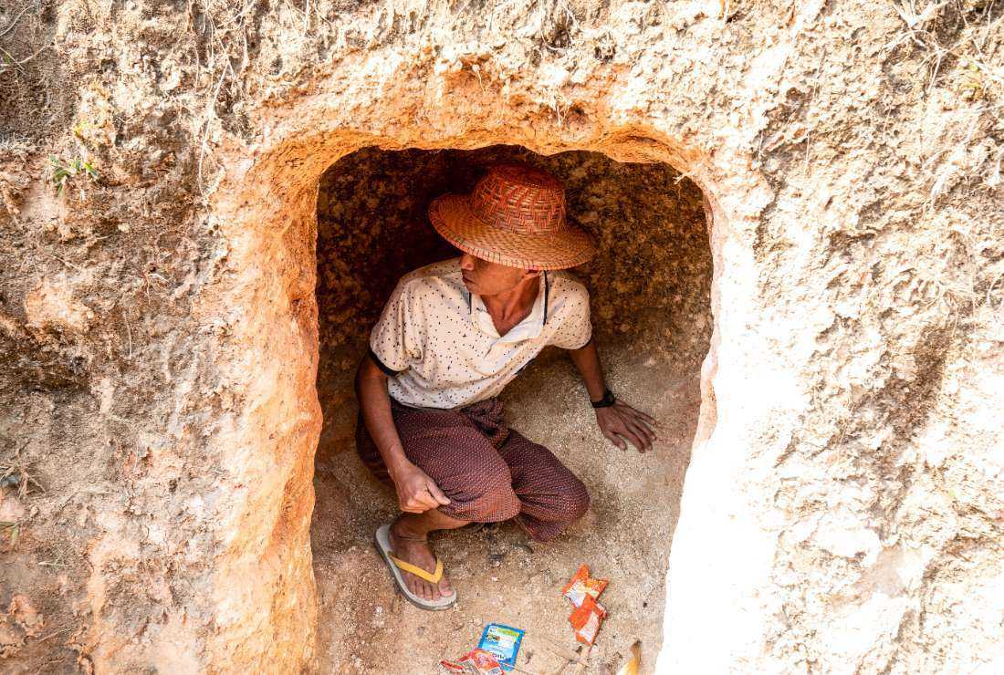 In this photo taken on March 9, a villager shows a bomb shelter used to protect from air strikes of Myanmar’s military at Kone Tar Village, Namhsan Township in Myanmar's northern Shan State