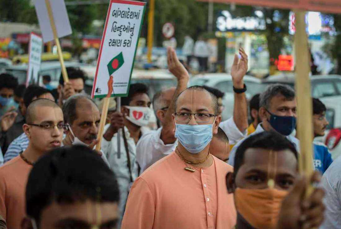 Devotees and activists from the International Society for Krishna Consciousness (ISKCON) take part in a demonstration on the outskirts of Ahmadabad on October 23, 2021, against the fresh religious violence against Hindus in Bangladesh.