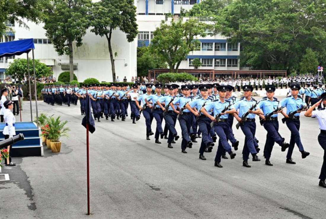 Zheng Yanxiong, Director of the Liaison Office of China’s Central Government in Hong Kong reviews the marching ranks of fresh graduates at the graduation ceremony at Hong Kong Police College on Sept. 16