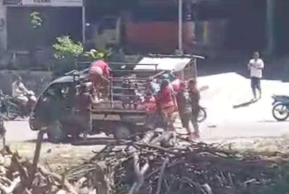 A screengrab of a video showing a group of men abducting a 20-year-old woman on Sumba Island in Indonedia's East Nusa Tenggara province to force her to marry a man according to a local tradition