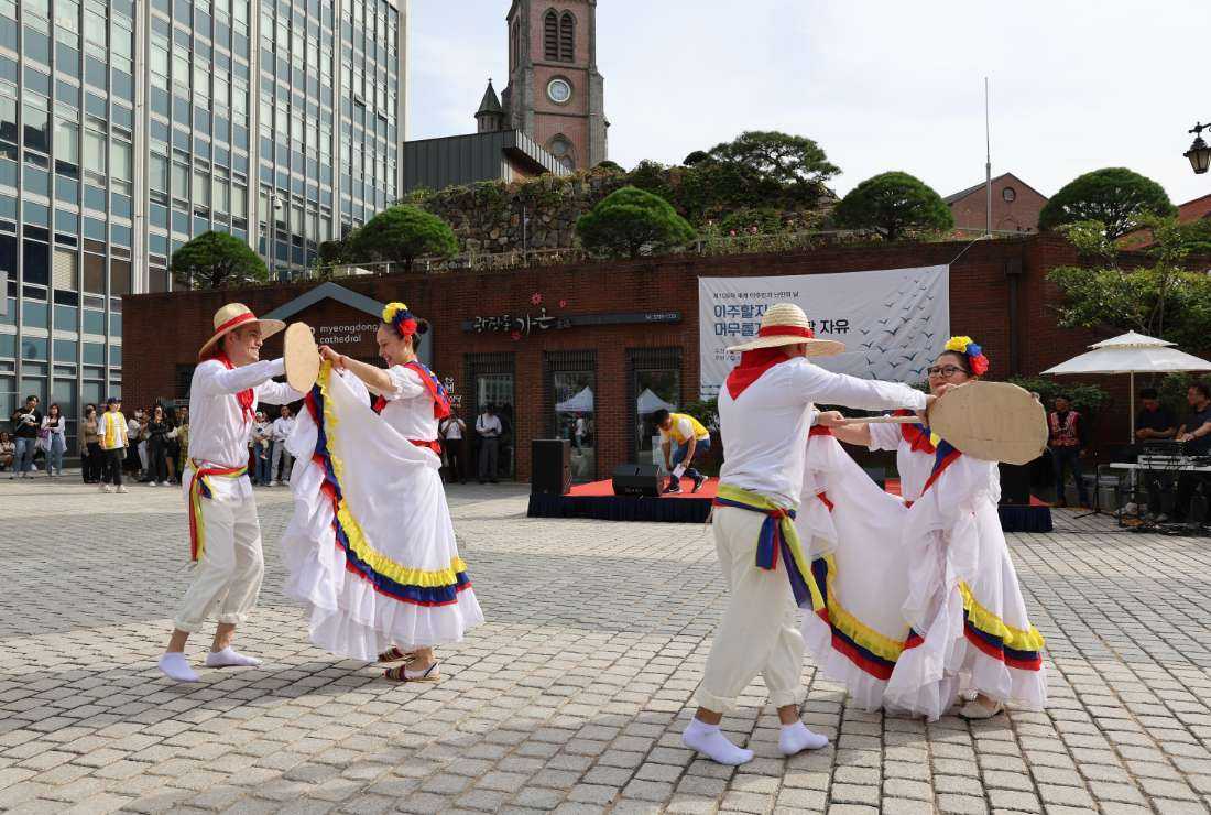 Migrants from South America perform a traditional dance to mark World Migrants and Refugees Day at Myeongdong Cathedral in Seoul, South Korea, on Sept. 24.