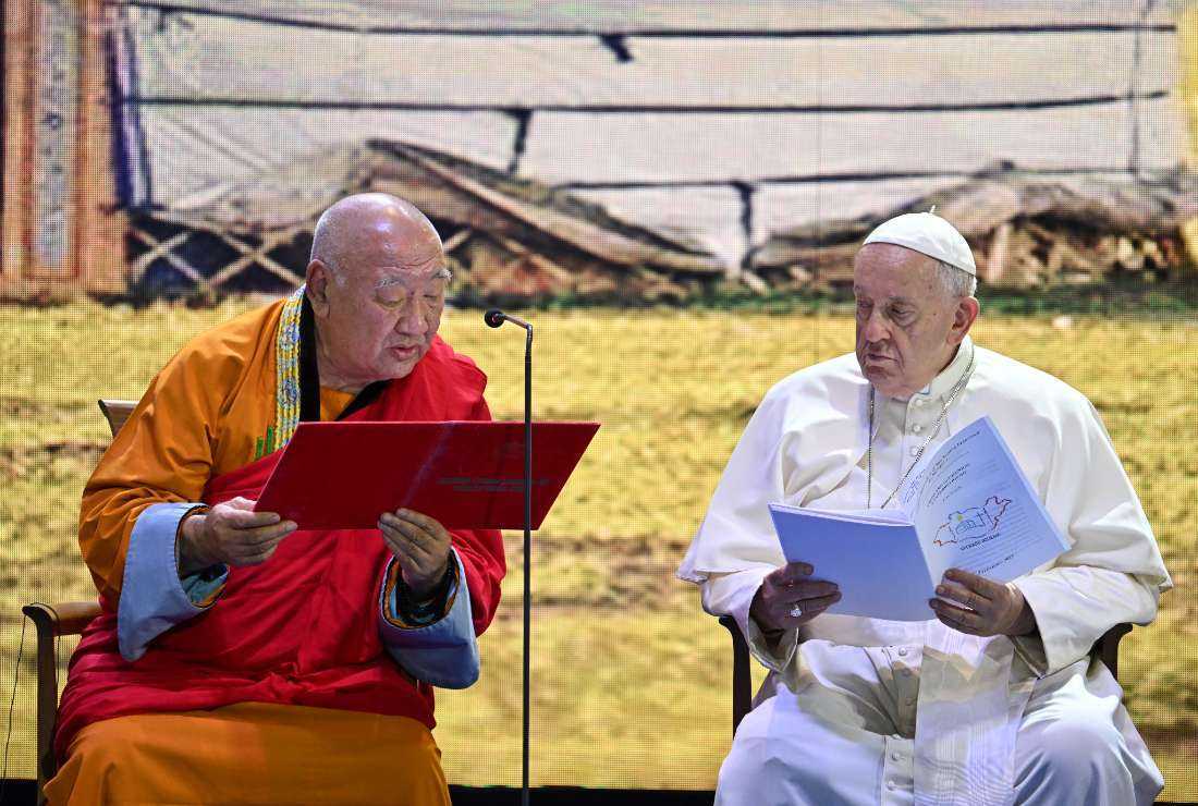 Pope Francis and a religious leader chat during an Ecumenical and interreligious meeting in Ulaanbaatar on September 3, 2023. Pope Francis will show support for interfaith dialogue during his final full day in the Mongolian capital of Ulaanbaatar, a visit that has seen him seek to build bridges with China