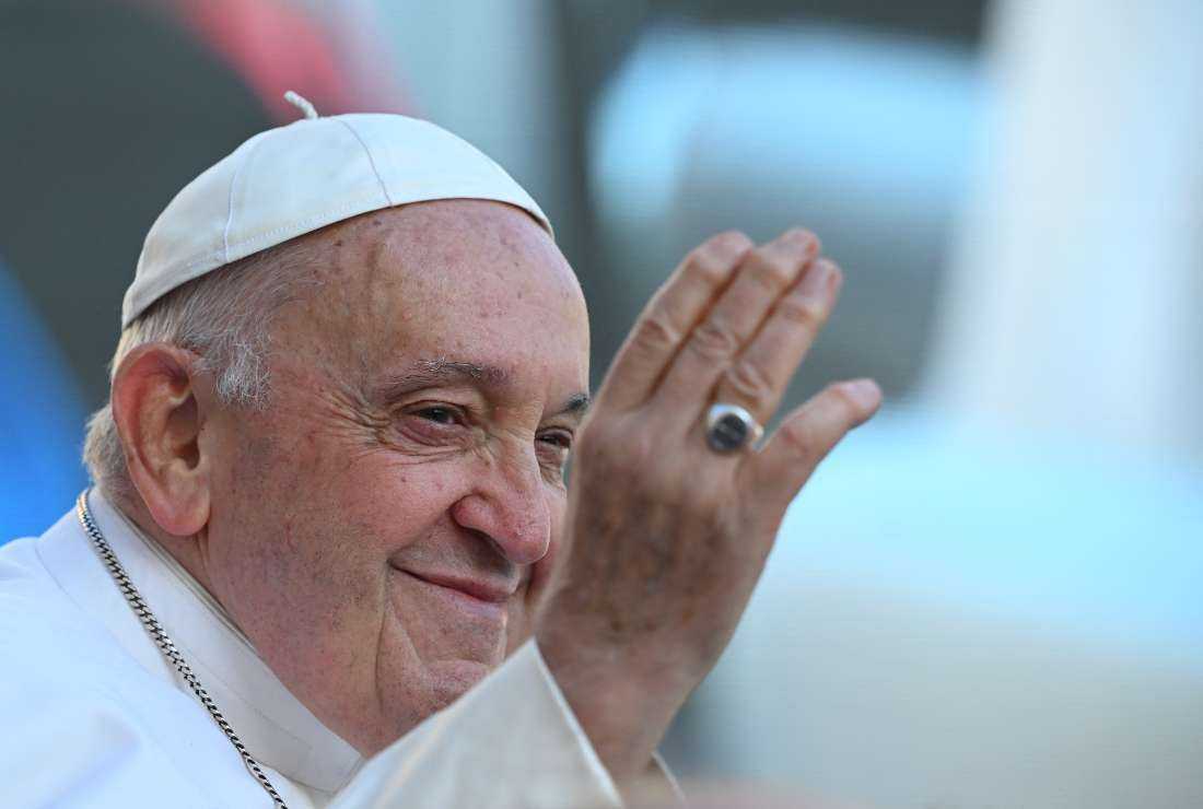Pope Francis greets the crowd as he arrives for the weekly general audience on Sept. 27 at St Peter's Square in The Vatican.