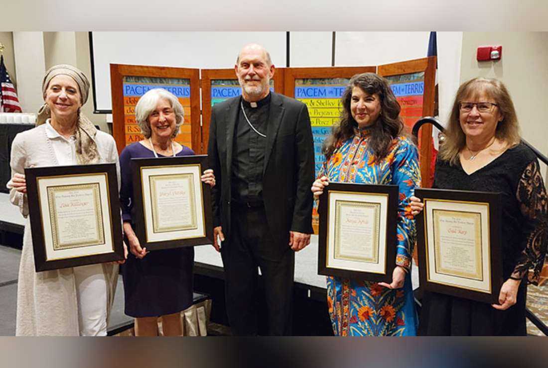 Archbishop-elect Thomas Zinkula stands with the One Among Us and Pacem in Terris Peace and Freedom Award winners Sept. 13 in the Rogalski Center at St. Ambrose University in Davenport. From left are Lisa Killinger, Sheryl Olitzky, Archbishop-elect Zinkula, Atiya Aftab and Gail Karp