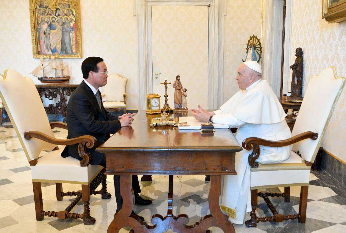 This photo taken and handout on July 27 by The Vatican Media shows Pope Francis and Vietnam's President Vo Van Thuong during a private audience at The Vatican