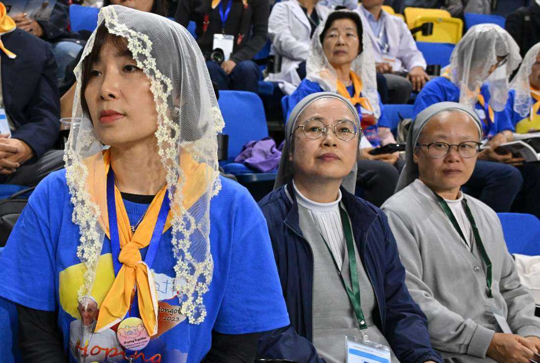 Catholics gather to attend the Mass of Pope Francis at the Steppe Arena in Ulaanbaatar on September 3, 2023. Pope Francis on September 3 hailed religion's power to resolve conflict and promote peace, on his final full day in the Mongolian capital of Ulaanbaatar for a visit that has seen him seek to build bridges with neighboring China