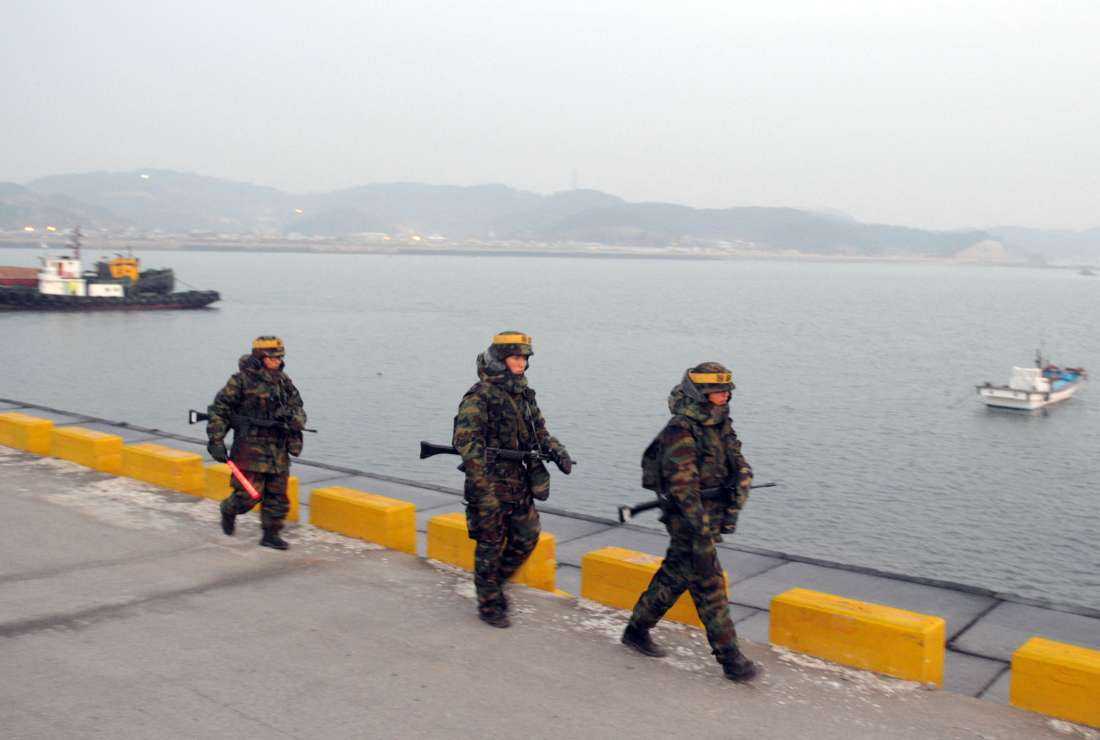 South Korean marines patrol on the South Korea-controlled island of Yeonpyeong near the disputed waters of the Yellow Sea on Dec. 21, 2010.