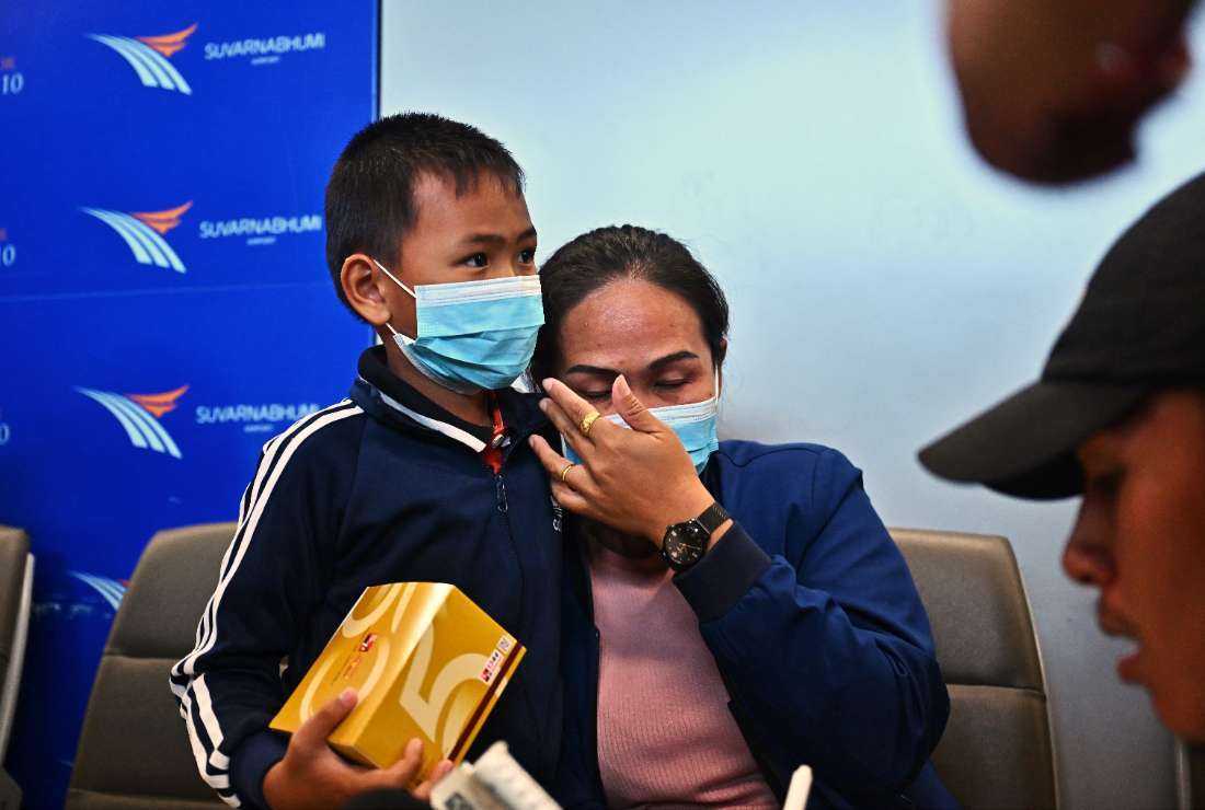 Relatives of Thai nationals working in Israel speak to Thai media before their loved ones’ arrival from being evacuated from Israel by plane, at Suvarnabhumi International Airport in Bangkok on Oct. 12, 2023