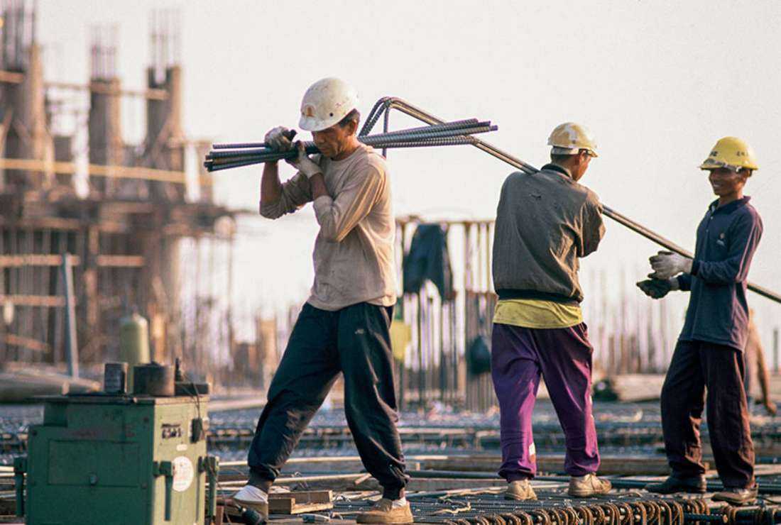  Workers are seen at a construction site in Taiwan in this file image. Rights group allege migrant workers are exploited by the existing labor broker system in the country.