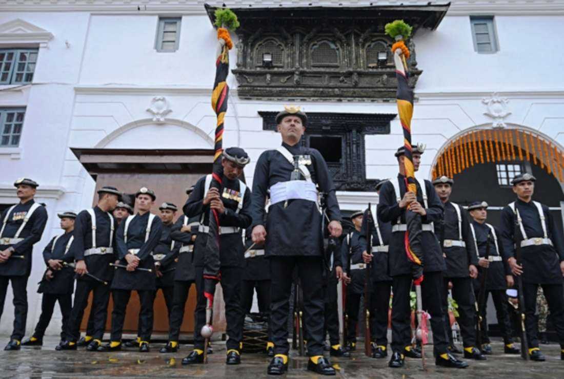 Nepal's soldiers stand guard at the Old Palace on the last day of the 'Indra Jatra' festival at Basantapur Durbar Square in Kathmandu on Oct. 2.
