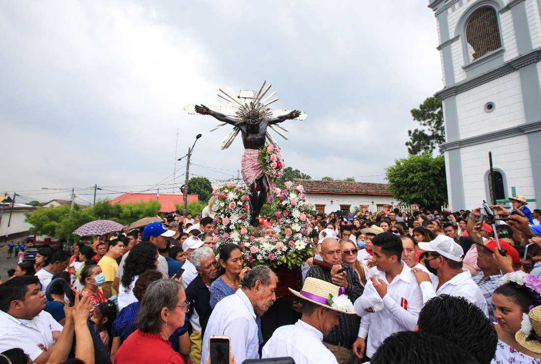 People take part in a procession outside a church during El Señor de Trinidad festivities in Masatepe, Nicaragua on June 4. 
