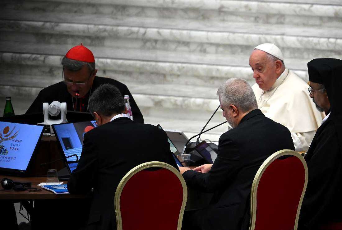 Pope Francis takes part in the opening session of the 16th General Assembly of the Synod of Bishops in the Paul VI hall at the Vatican on Oct. 4.
