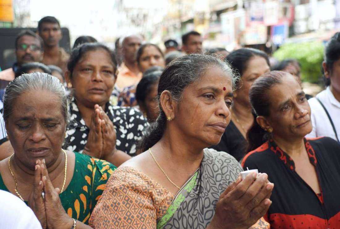 People gather to mourn the victims of 2019 Easter Sunday attacks outside the heavily guarded St Anthony's Shrine in Sri Lanka in this file image.