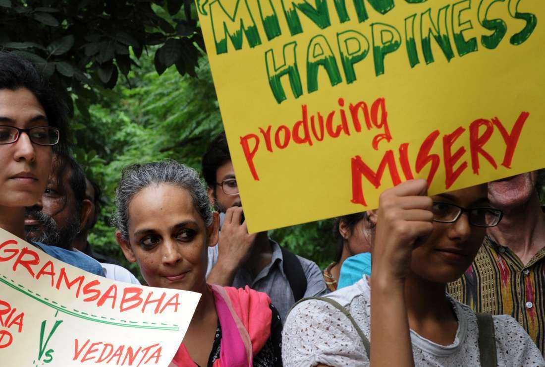 Eastern Indian state of Odisha has a long history of protest against transnational mining firms. Booker Prize winner Arundhati Roy (center) at a demonstration against bauxite mining by Vedanta in 2013. 