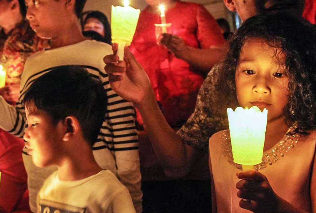 This file photo shows children attending prayers at a Catholic Church in Medan, North Sumatra, Indonesia in 2019. Catholic-majority Flores Island has seen a rise in child abuse cases in recent times